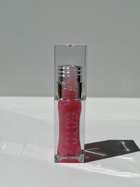 Glossed color changing lip oil